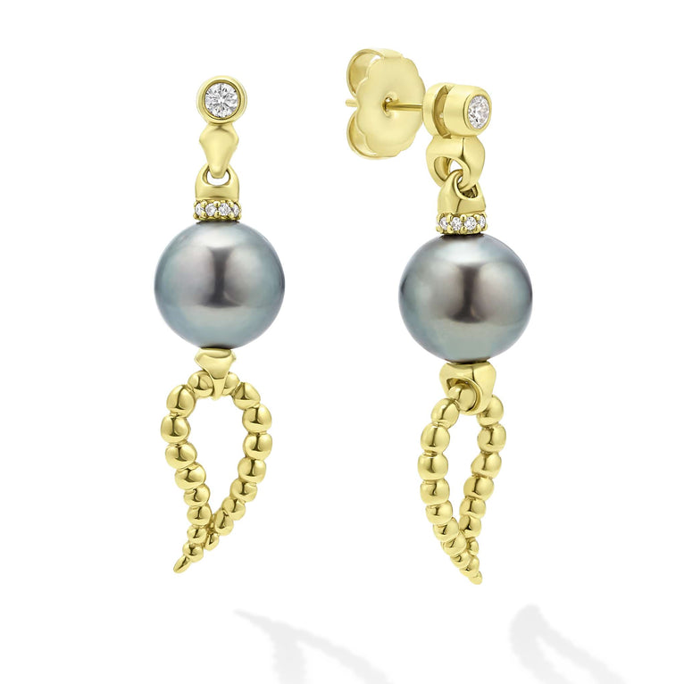 Featuring luminous black Tahitian pearls and a touch of sparkle from delicate diamonds, these drop earrings are perfect for adding a sophisticated edge to any look.