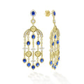 18K gold, diamonds and blue sapphire gemstones form these elaborate chandelier drop earrings. LAGOS diamonds are the highest quality natural stones.