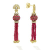 Five ruby strands, 18K gold Caviar beading, and diamond accents form these dramatic drop earrings.
