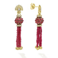 Five ruby strands, 18K gold Caviar beading, and diamond accents form these dramatic drop earrings.