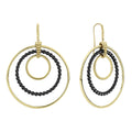 Triple circle drop earrings with smooth 18k gold and black ceramic.