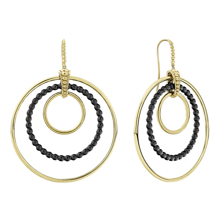 Triple circle drop earrings with smooth 18k gold and black ceramic.