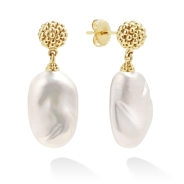 18K gold Caviar beading frame these cultured freshwater pearl baroque drop earrings.
