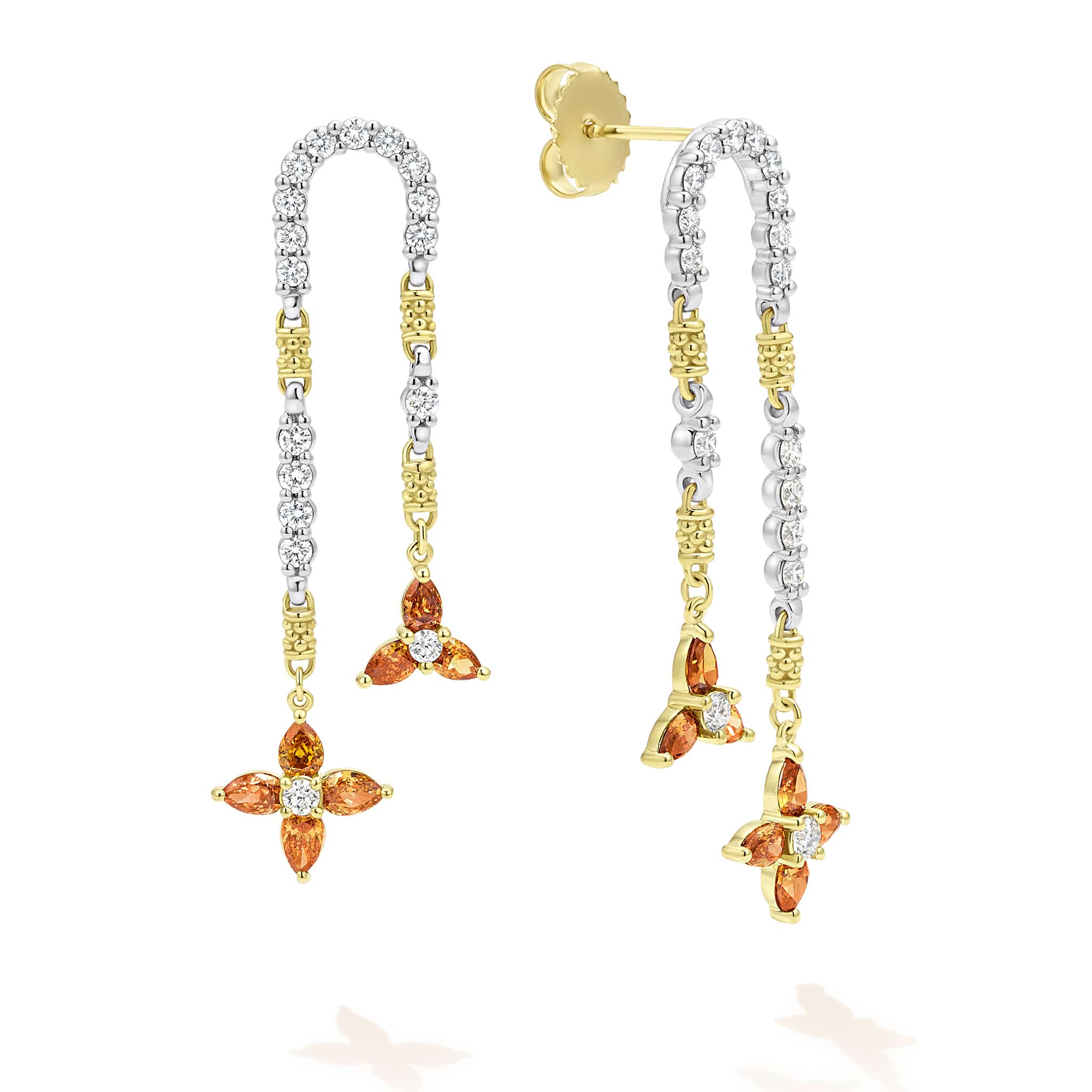 This stunning style features a combination of 14 orange pear diamonds and 34 white brilliant round diamonds set in 18k yellow and white gold.