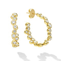 18K Gold hoop earrings with bezel-set diamonds and friction back closure on white background 