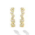 18K Gold hoop earrings with bezel-set diamonds on white background 