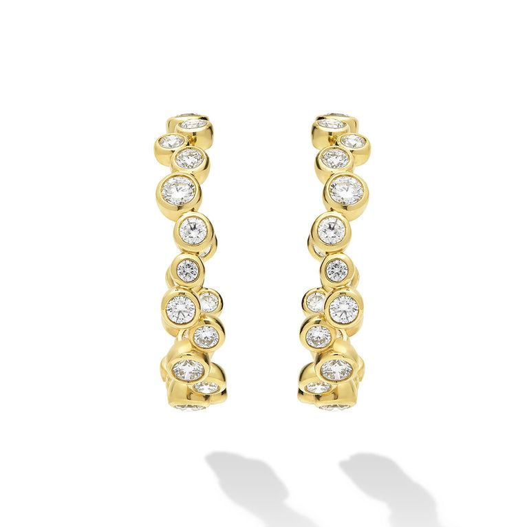 18K Gold hoop earrings with bezel-set diamonds on white background 