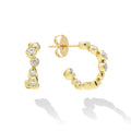 18K Gold huggie earrings with bezel-set diamonds and friction back closure on white background 