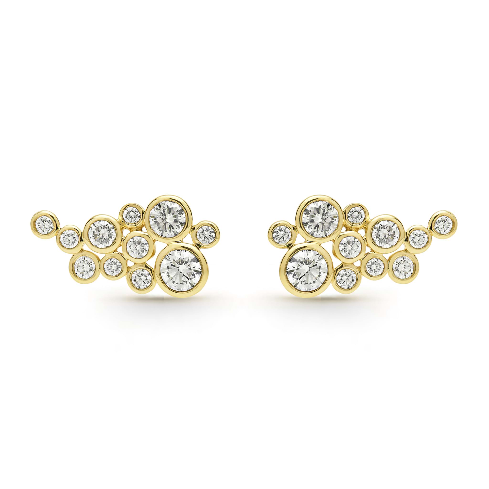Eleven bezel-cut diamond stud earrings set in 18K gold on a white background
