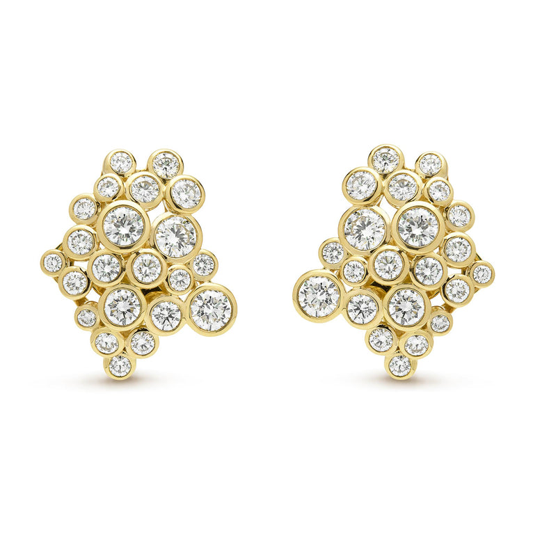 cluster diamond set in 18K gold statement earrings on white background