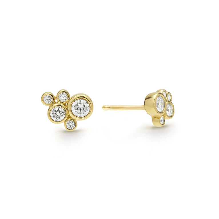 Five bezel-cut diamond stud earrings set in 18K gold with post on a white background