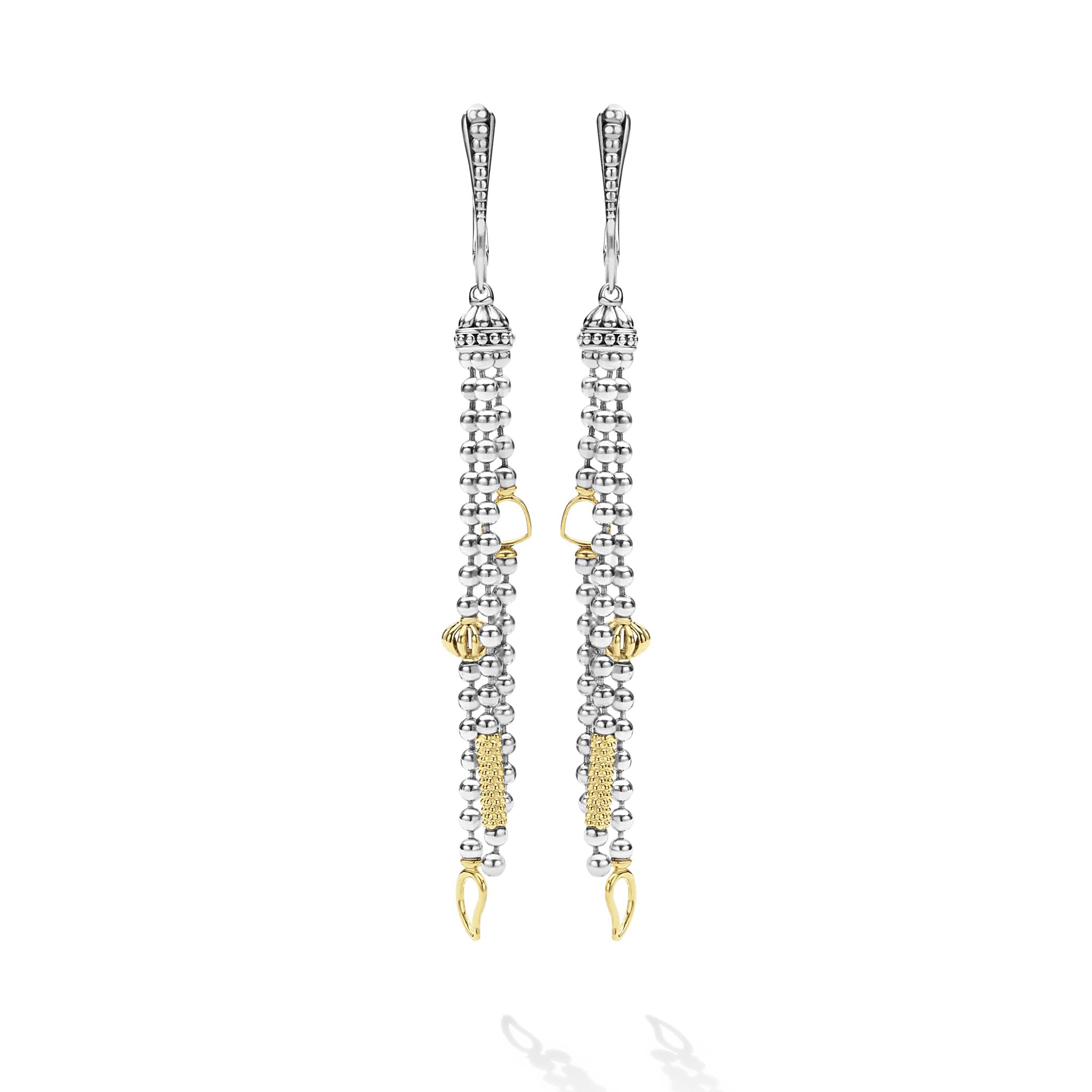 Caviar Icon Two-Tone Caviar Tassel Earrings with sterling silver and 18K gold accents, featuring signature beading and lever-back ear wires for modern elegance.