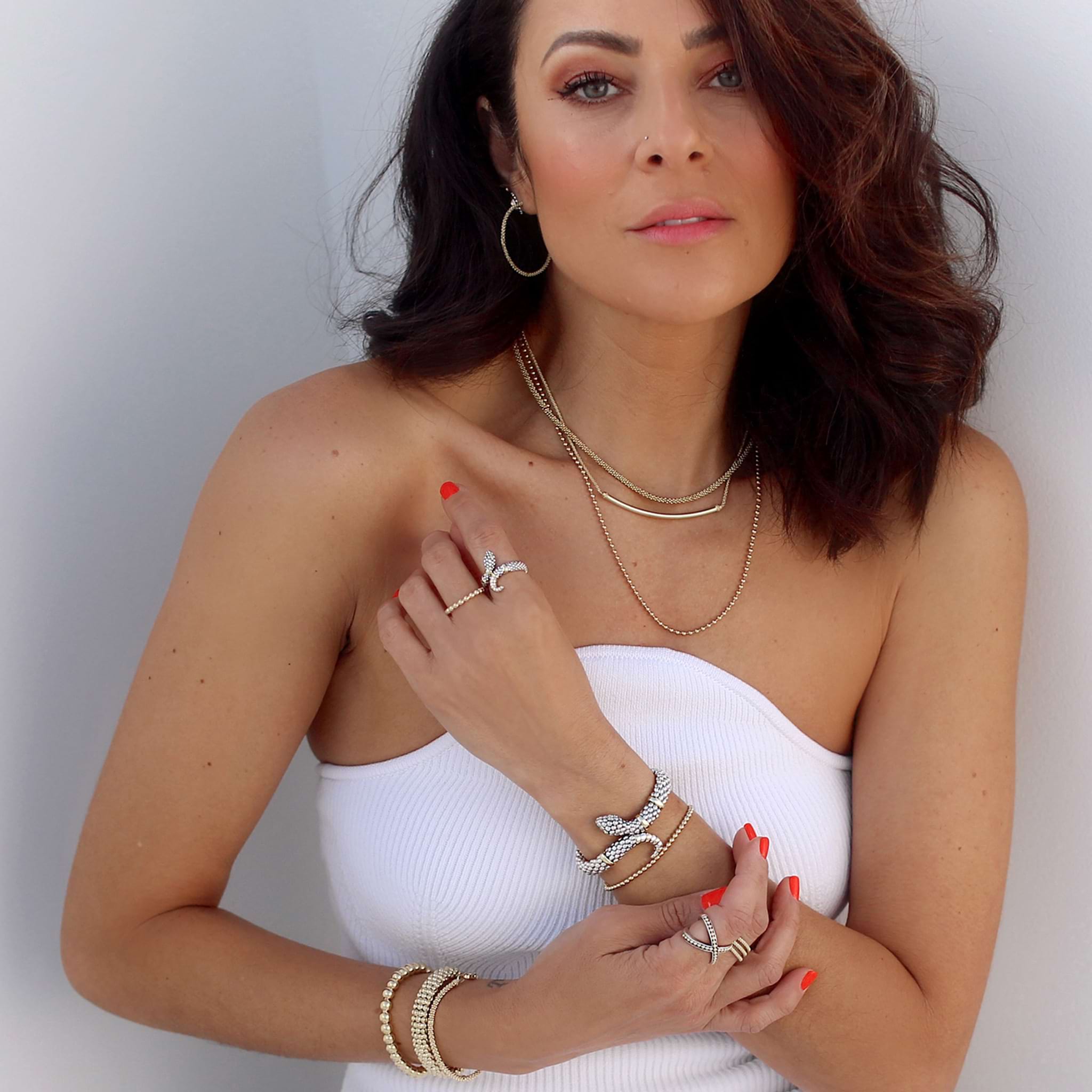 Model wearing two-tone LAGOS jewelry
