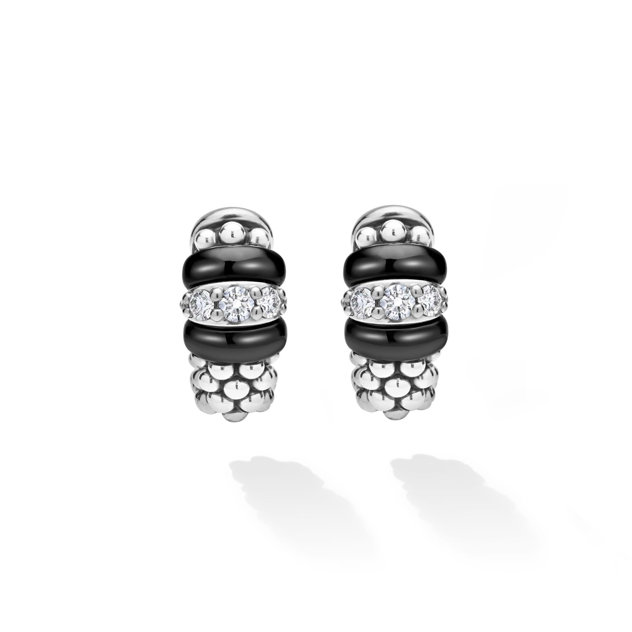 front of sterling silver beaded huggie earrings with black ceramic and diamond details