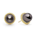 A tahitian black pearl stud earrings set in 18K gold Caviar beading. Just the right touch for every day.