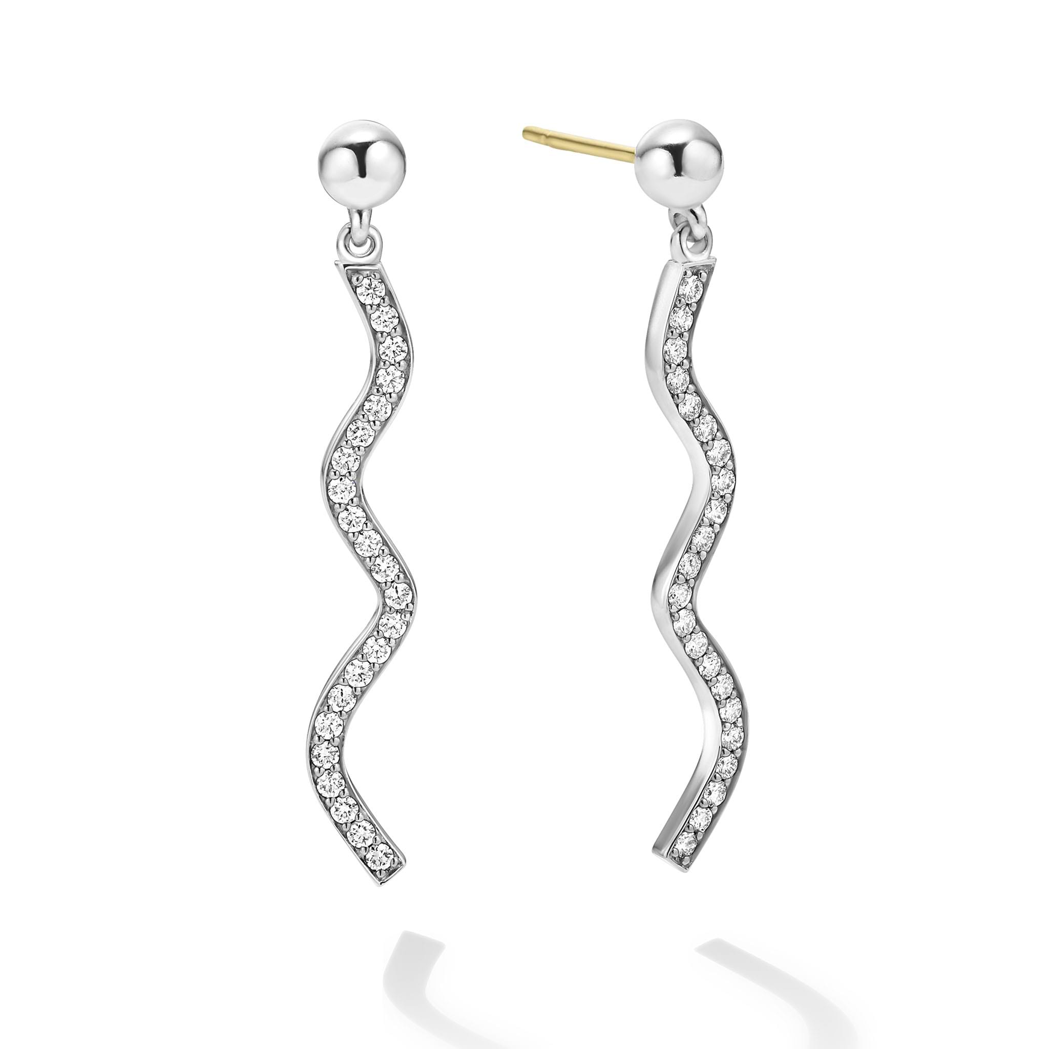 Sterling silver and diamonds form these wave drop earrings. Perfect for a bold, everyday look. LAGOS diamonds are the highest quality natural stones.