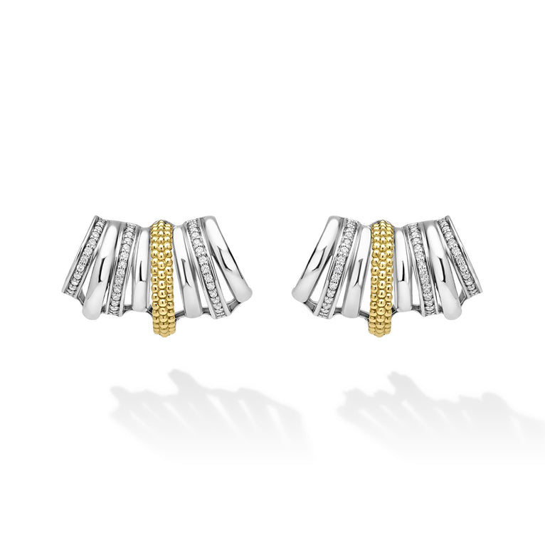 Front of sterling silver huggie earrings with gold details and diamonds