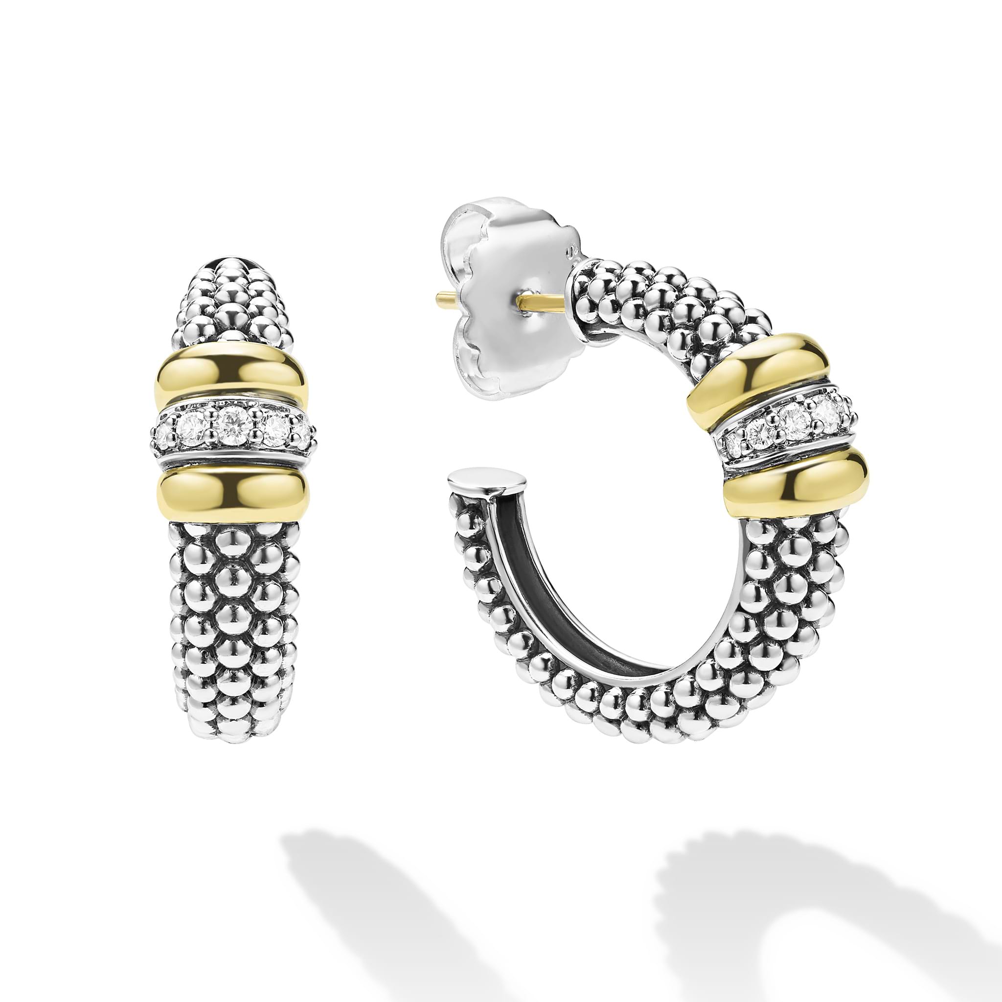 side of medium sterling silver beaded hoop earrings with gold and diamond accents backing