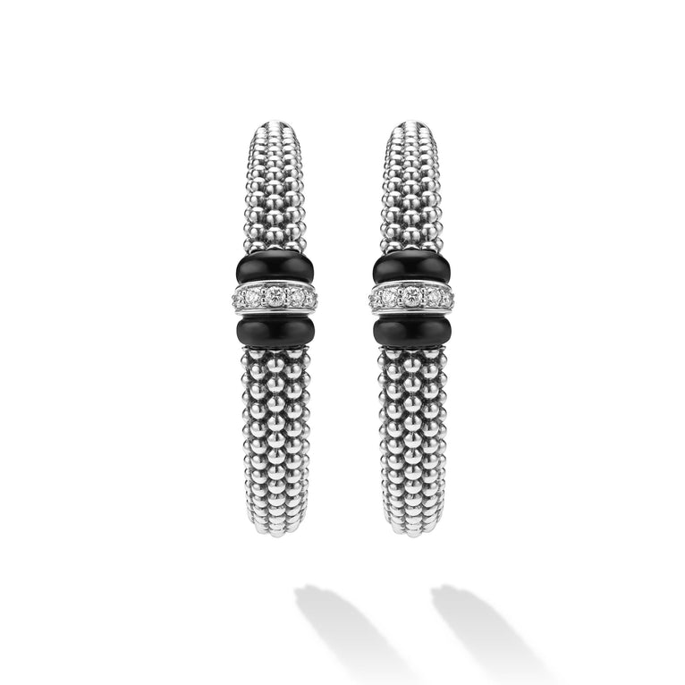 front of large sterling silver beaded hoop earrings with black ceramic and diamond details