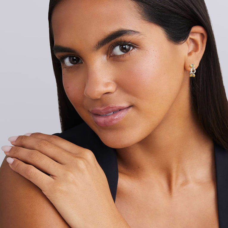 woman wearing Tiny beaded sterling silver and gold link hoop earrings with diamonds