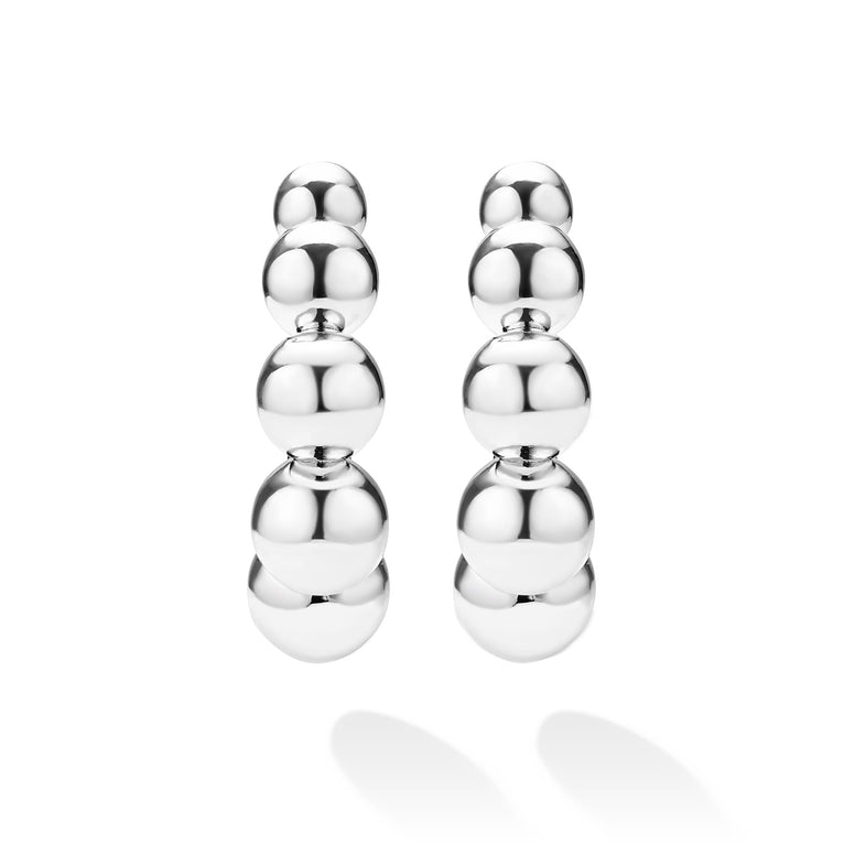 front of large beaded sterling silver hoop earrings