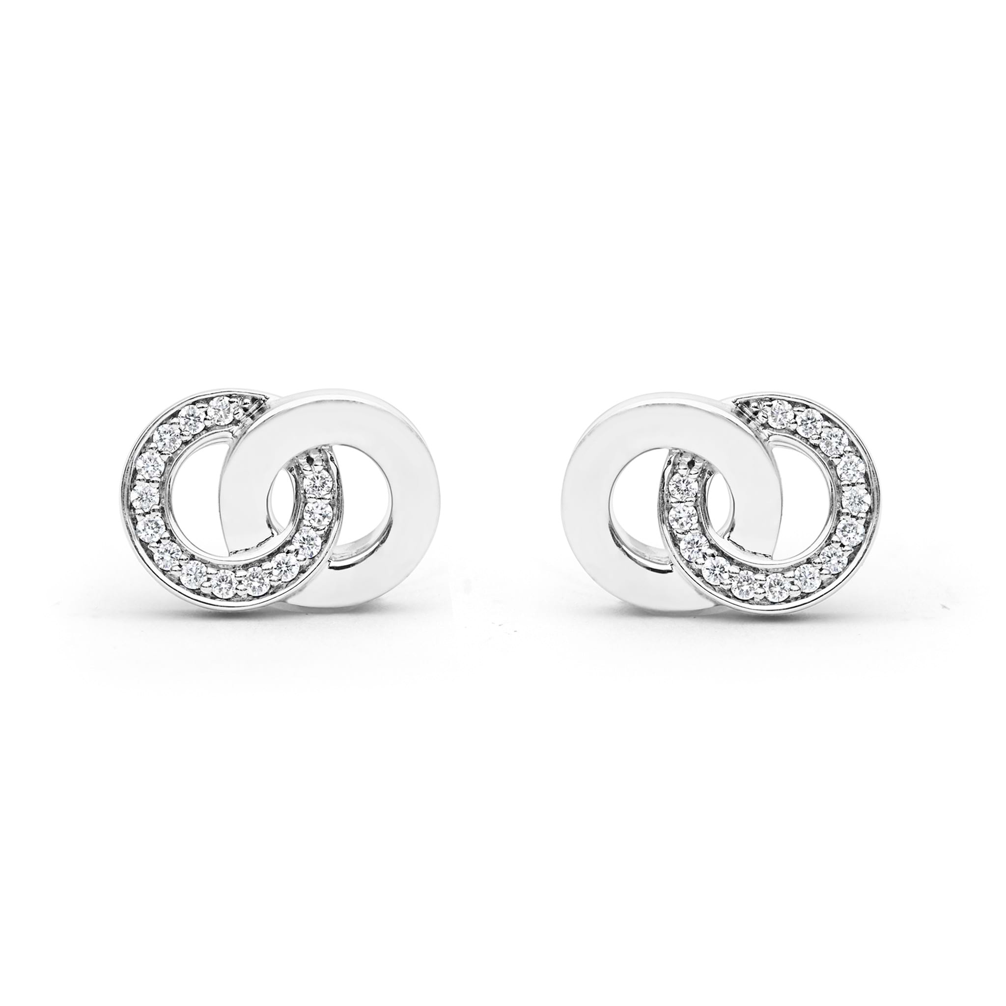 Signature Caviar Silver Interlocking Diamond Stud Earrings feature polished sterling silver loops with pavé-set stones, showcasing elegance and timeless design.