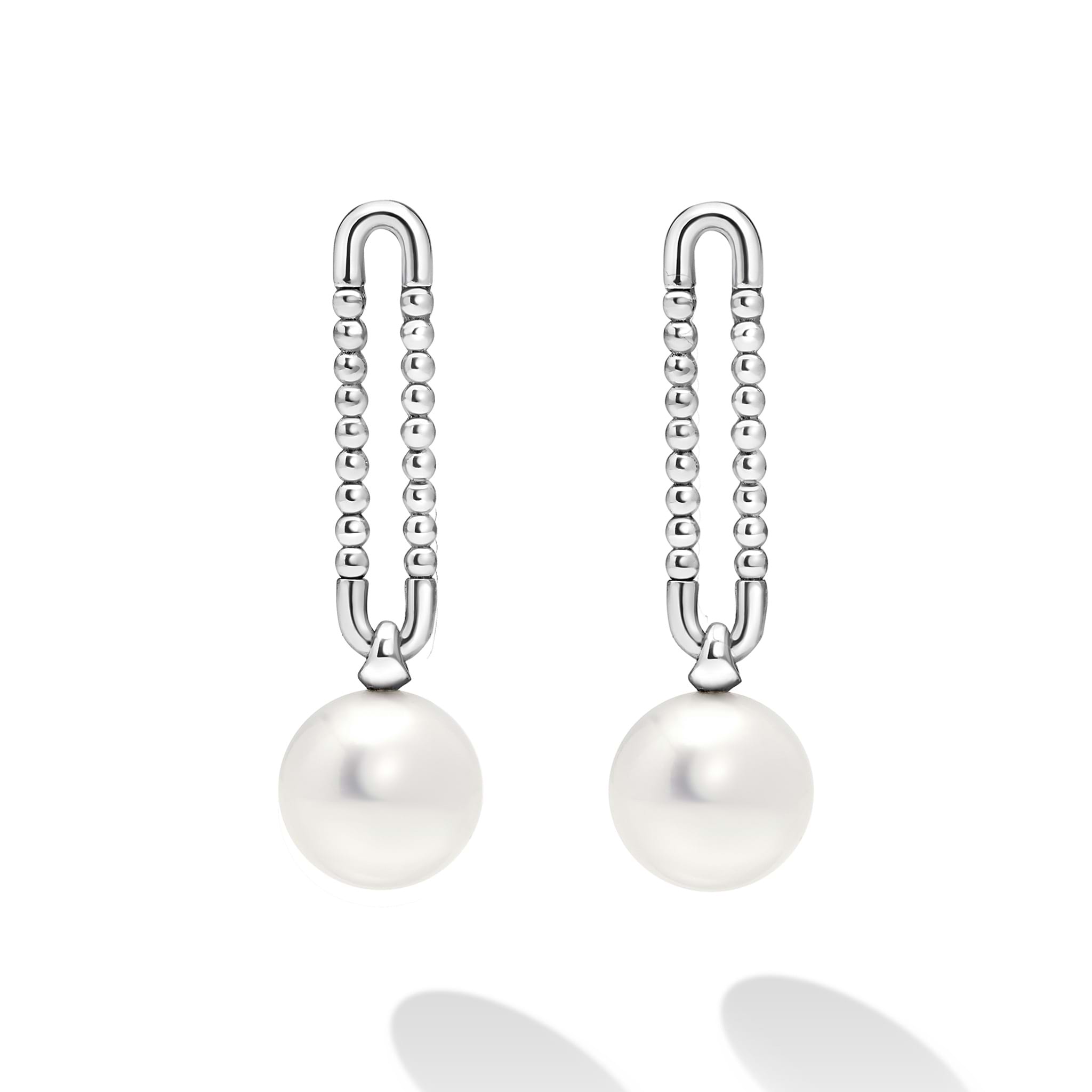 Luna Sterling Silver Pearl Drop Earrings feature U-shaped loops with strands of silver beads ending in lustrous pearls, showcasing LAGOS' elegance and craftsmanship.