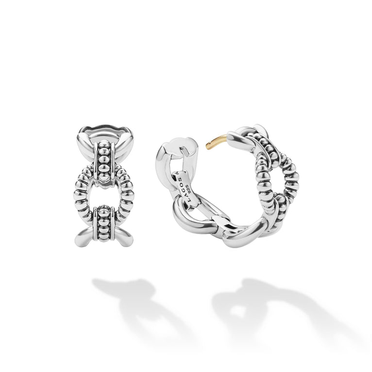 Signature Caviar Sterling Silver Caviar Link Oval Hoop Earrings with beaded knot motifs and gold-tone accents, showcasing elegance and craftsmanship.