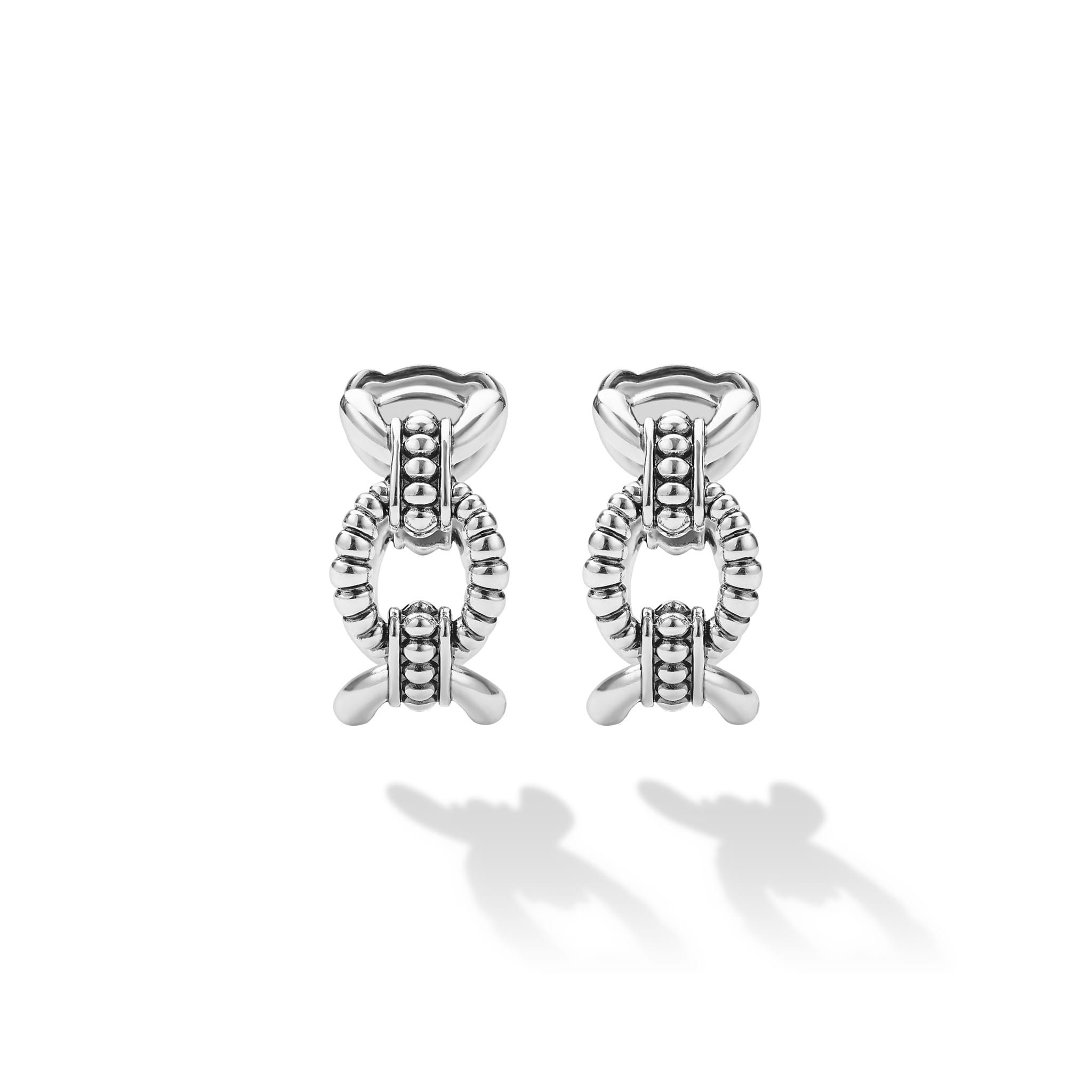 Signature Caviar Sterling Silver Caviar Link Oval Hoop Earrings feature textured hoops.