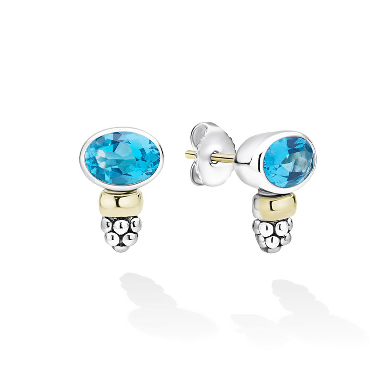 Signature Caviar Two-Tone Swiss Blue Topaz Oval Stud Earrings featuring blue topaz gemstones in sterling silver bezels, accented with 14K gold beads and caviar beading.