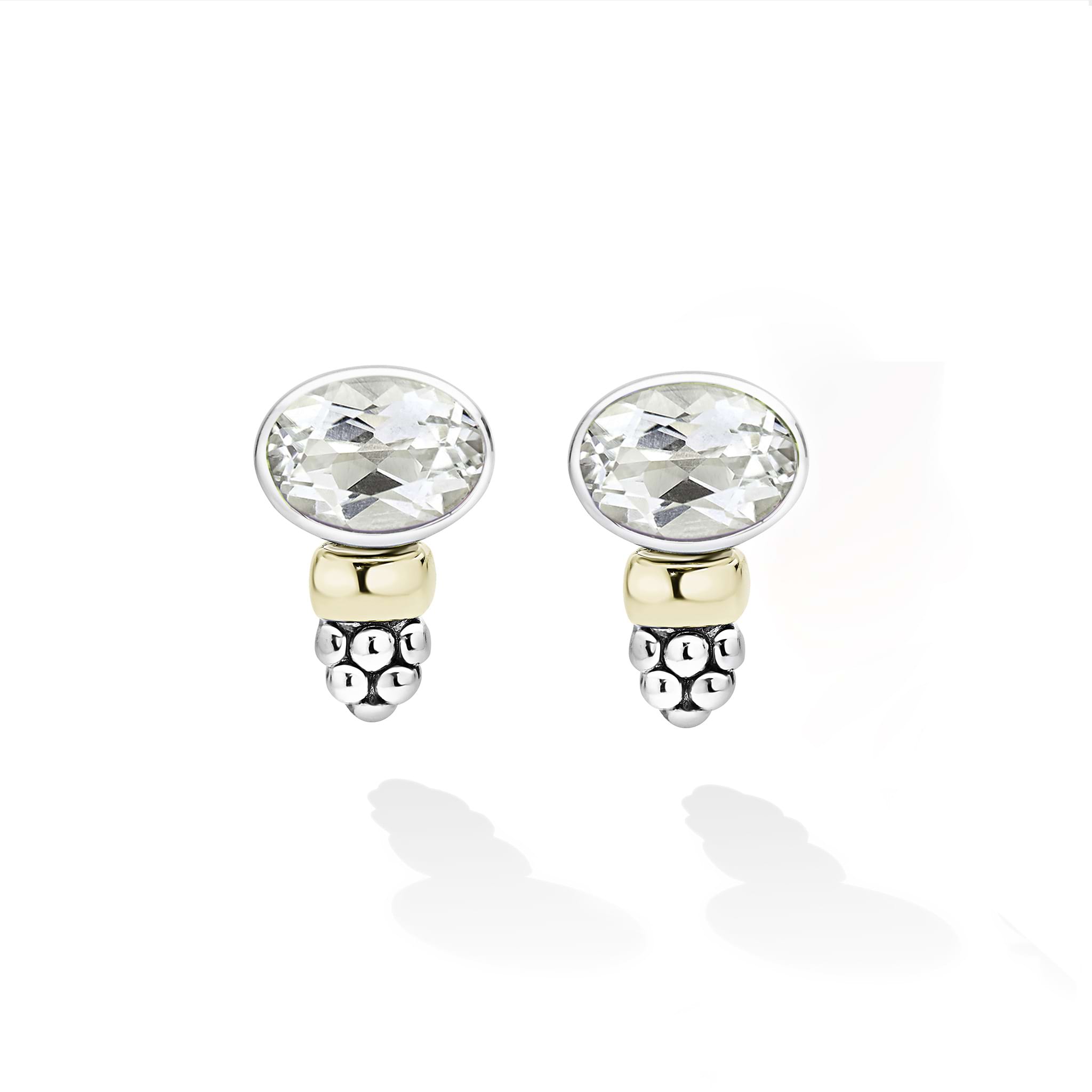 Signature Caviar Two-Tone White Topaz Oval Stud Earrings feature a faceted white topaz gemstone, 14K gold bead, and sterling silver caviar beading, showcasing elegant mixed-metal design.