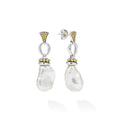 A pair of silver drop earrings featuring irregular white baroque pearls, accented with yellow gold at the top and middle, shown on a clean white background.