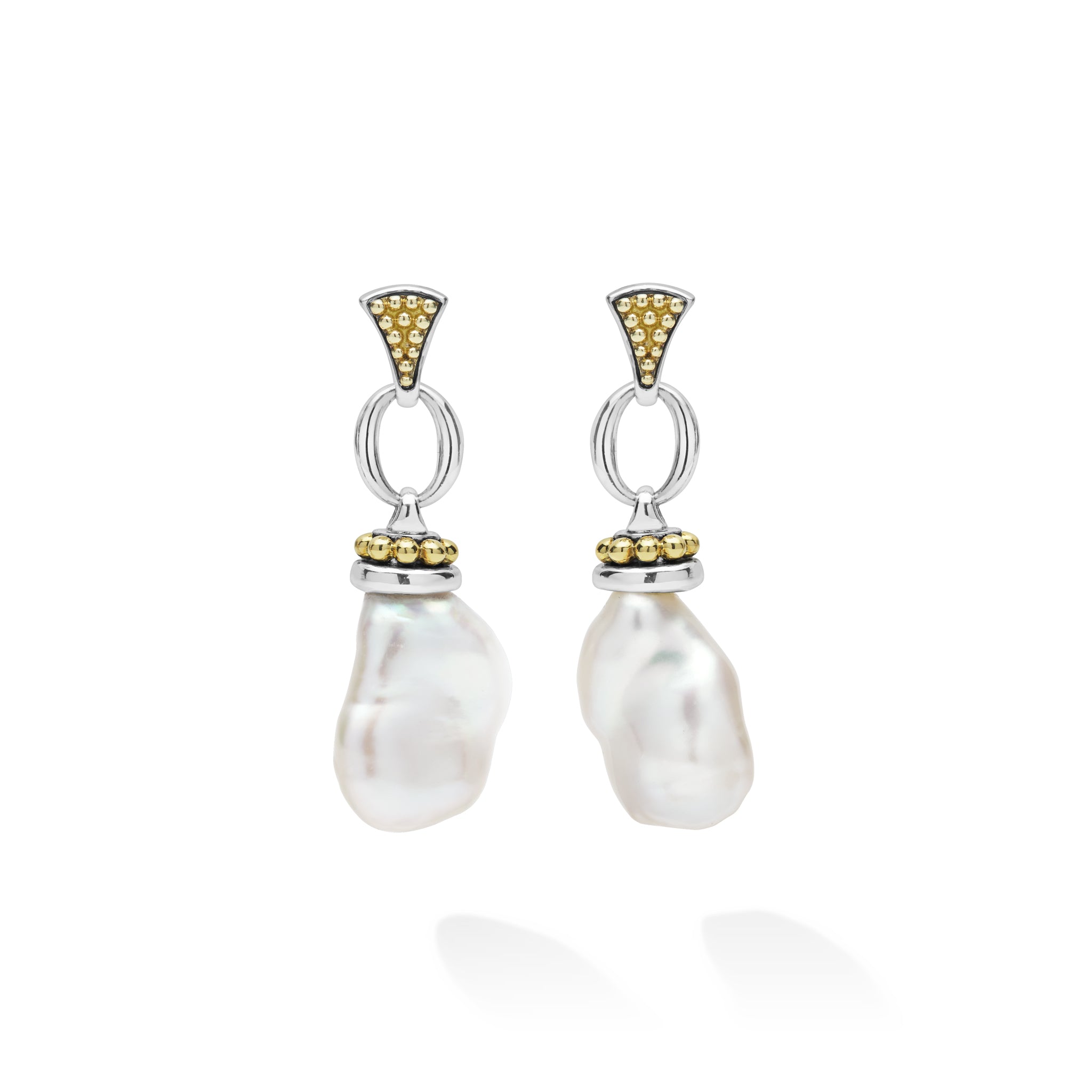 A pair of silver drop earrings featuring irregular white baroque pearls, accented with gold in triangular and circular settings, shown on a clean white background.