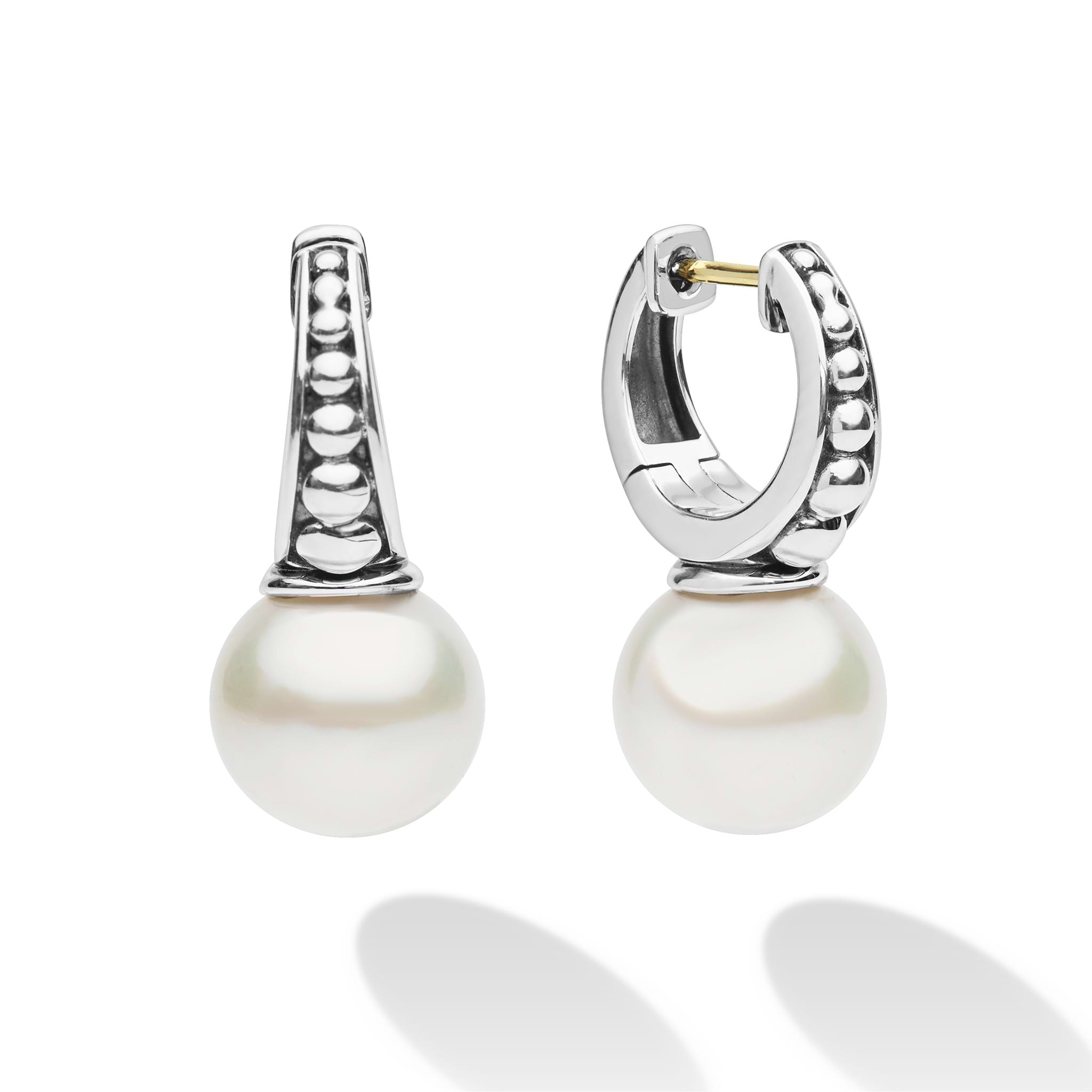 Luna Sterling Silver Pearl Drop Huggie Earrings with caviar beading detail, featuring large pearl drops on polished sterling silver hoops, offering classic elegance and modern design.