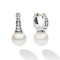 Luna Sterling Silver Pearl Drop Huggie Earrings with caviar beading detail, featuring large pearl drops on polished sterling silver hoops, offering classic elegance and modern design.