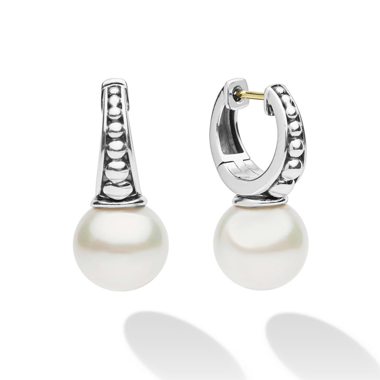 Luna Sterling Silver Pearl Drop Huggie Earrings with caviar beading detail, featuring large pearl drops on polished sterling silver hoops, offering classic elegance and modern design.