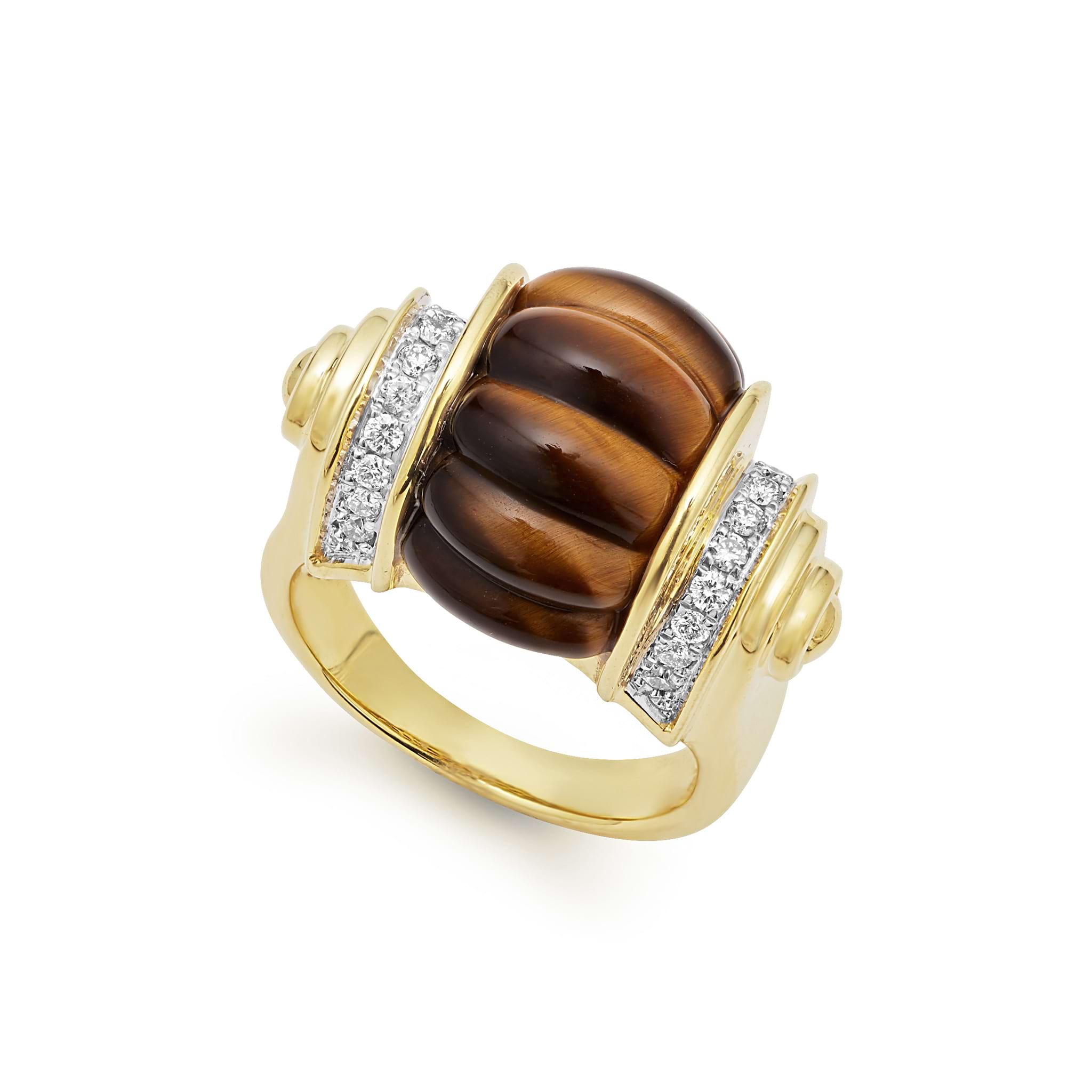 This beautiful ring combines the striking appearence of tigerseye and the brilliant radiance of diamonds. Set in a beautifully crafted 18k gold band.