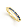 18k gold and brilliant cut blue sapphire gemstones form this elevated every day stacking ring.