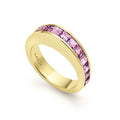 Square cut amethyst gemstones surrounded by smooth 18K gold form this stacking ring.