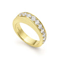 Diamonds surrounded by smooth 18K gold form this statement stacking ring. LAGOS diamonds are the highest quality natural stones.