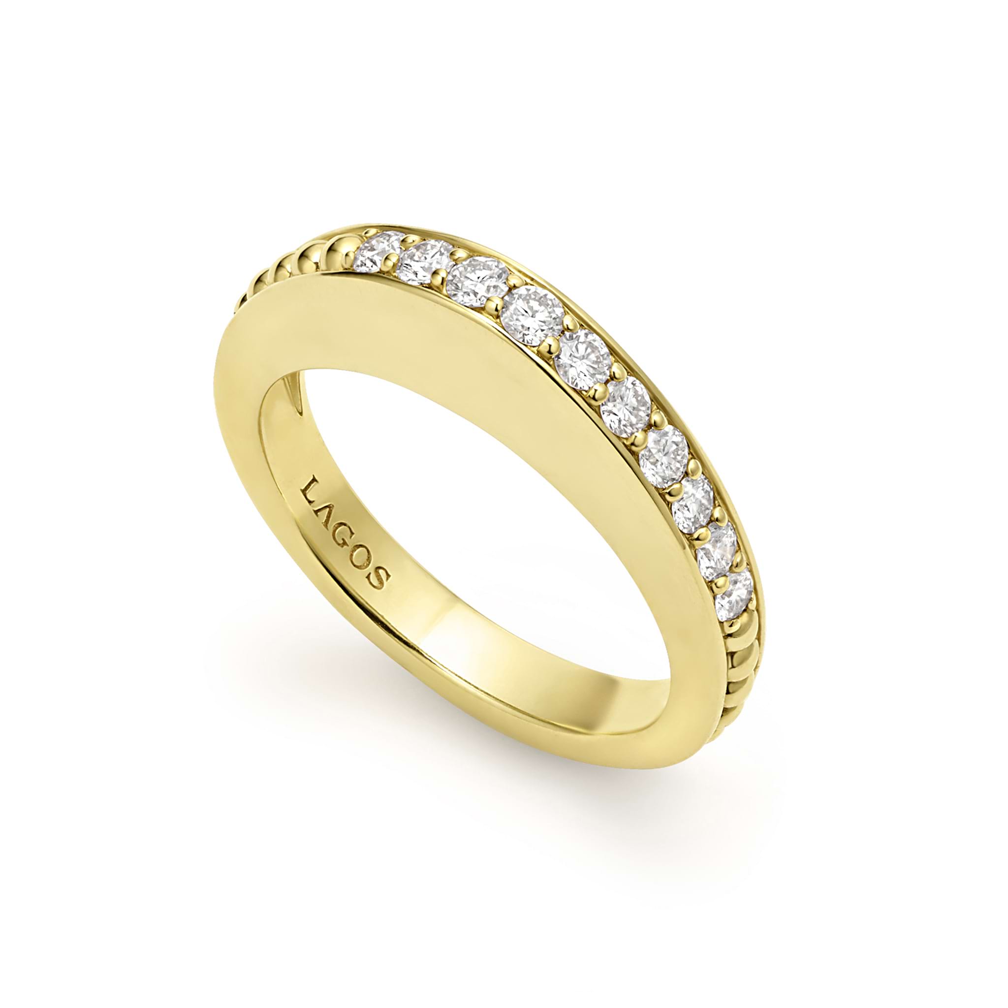 Diamonds surrounded by smooth 18K gold form this stacking ring. LAGOS diamonds are the highest quality natural stones.
