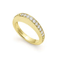 Diamonds surrounded by smooth 18K gold form this stacking ring. LAGOS diamonds are the highest quality natural stones.