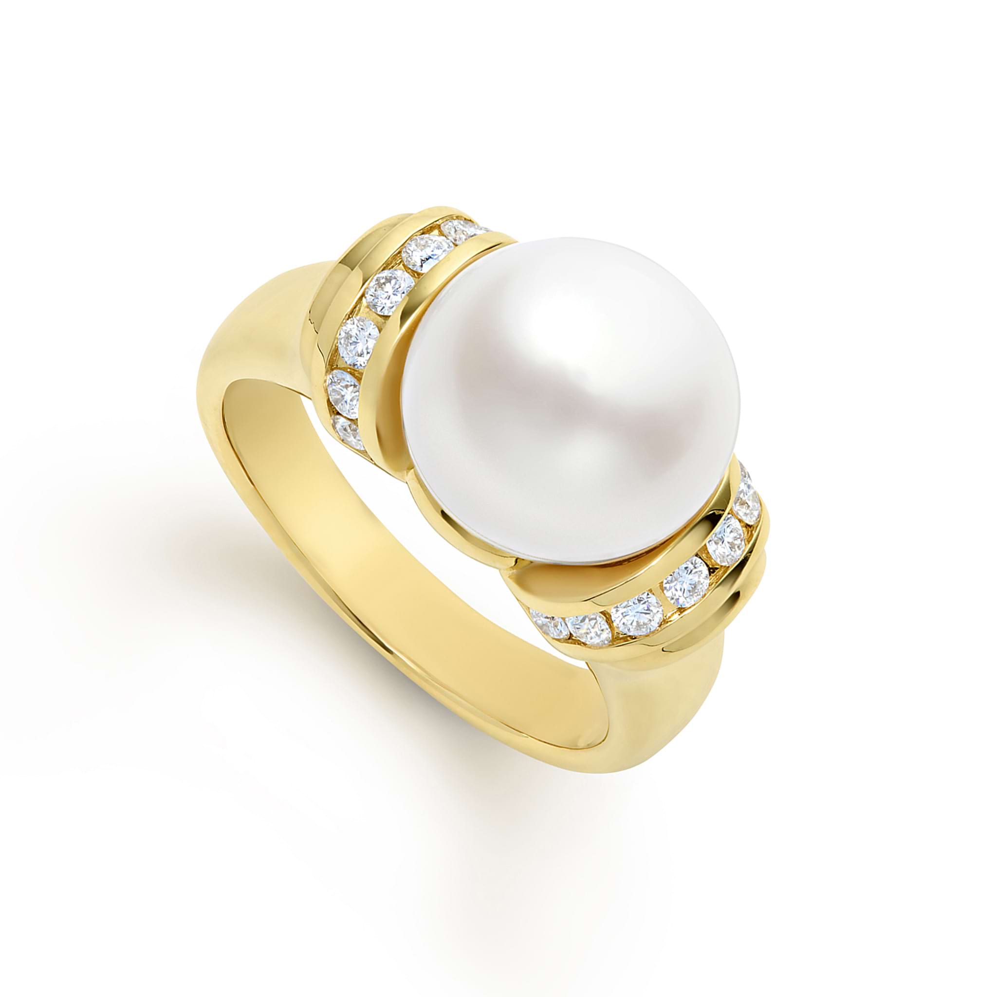 A statement cultured freshwater pearl combined with smooth 18k gold and diamonds form this timeless statement ring. LAGOS diamonds are the highest quality natural stones.