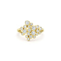 front of bezel-cut diamond cluster statement ring set in 18K gold on white background