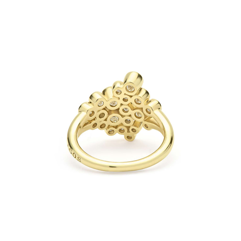 back of bezel-cut diamond cluster statement ring set in 18K gold on white background