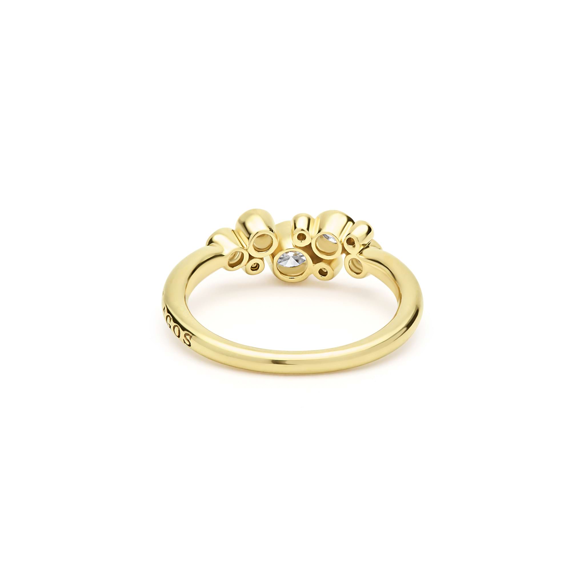 back of nine bezel-cut diamond ring set in 18K gold on white background