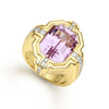This striking emerald-cut kunite exudes timeless elegance, elegantly held in place by a diamond encrusted setting. The 18k gold frame further enhances this ring's captivating beauty.