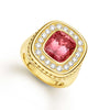 A vibrant pink tourmaline cushion-cut gemstone is beautifully encircled by a halo of sparkling diamonds. The 18k gold setting enhances the ring's sophisticated charm, making it the perfect piece for any occasion.