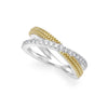 Diamonds and 18k gold Caviar beading on a sterling silver band form this X-ring. LAGOS diamonds are the highest quality natural stones.