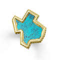 Intricately crafted turquoise gemstone and 18K gold in a Texas motif shape surrounded by sterling silver forms this statement ring. Perfect for a bold look.